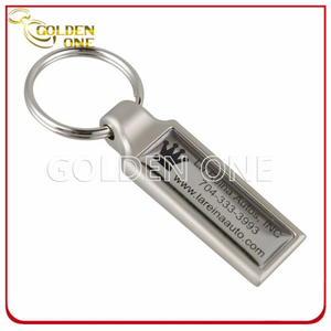 Regala una etiqueta de llave de metal con logotipo impreso y epoxi personalizado